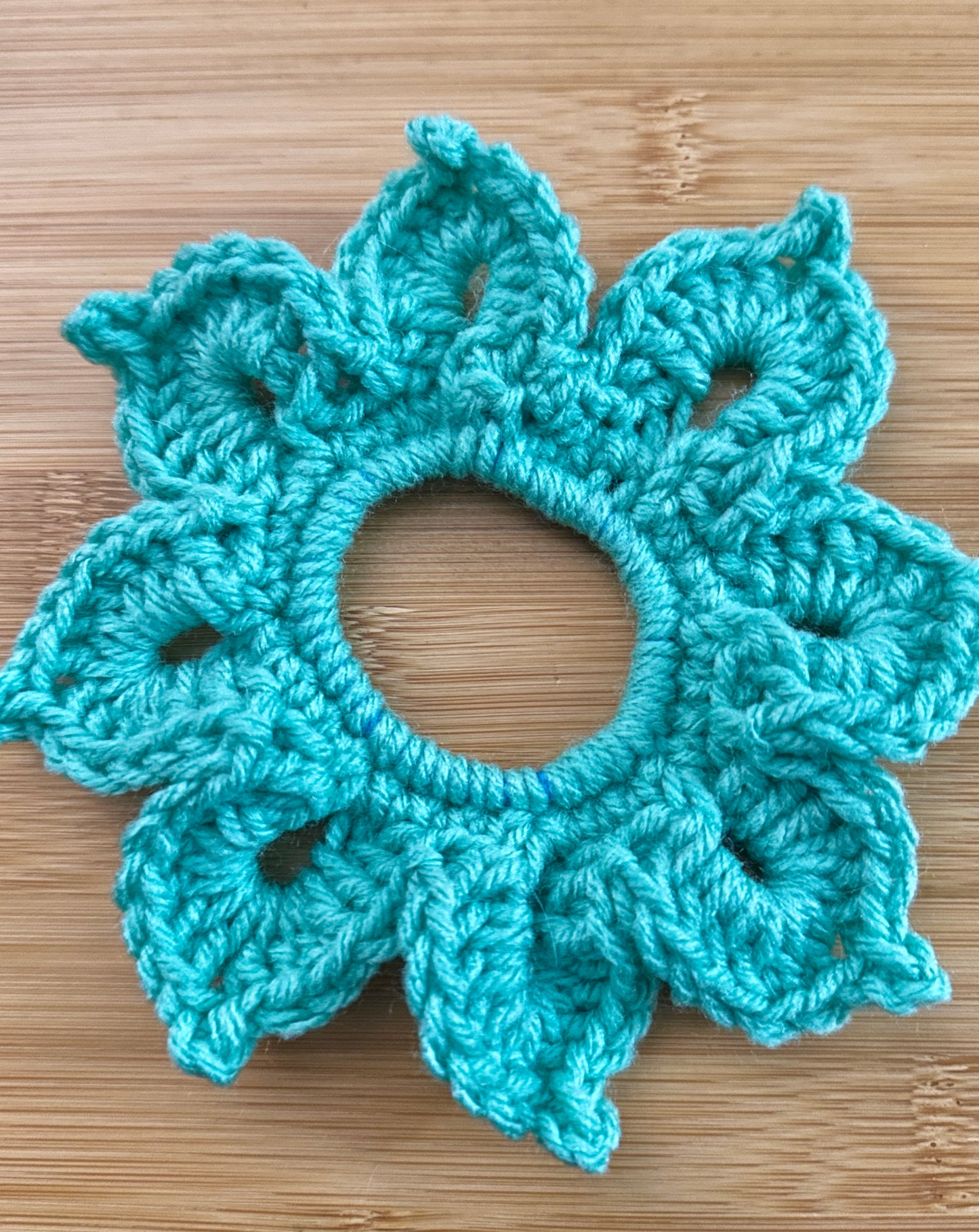 Crocheted floral hair scrunchies